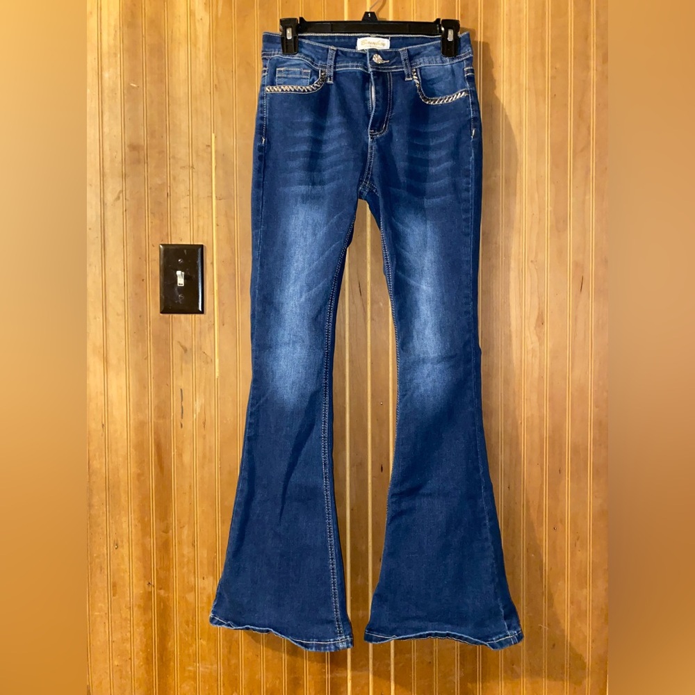Dark blue flared jeans for women.